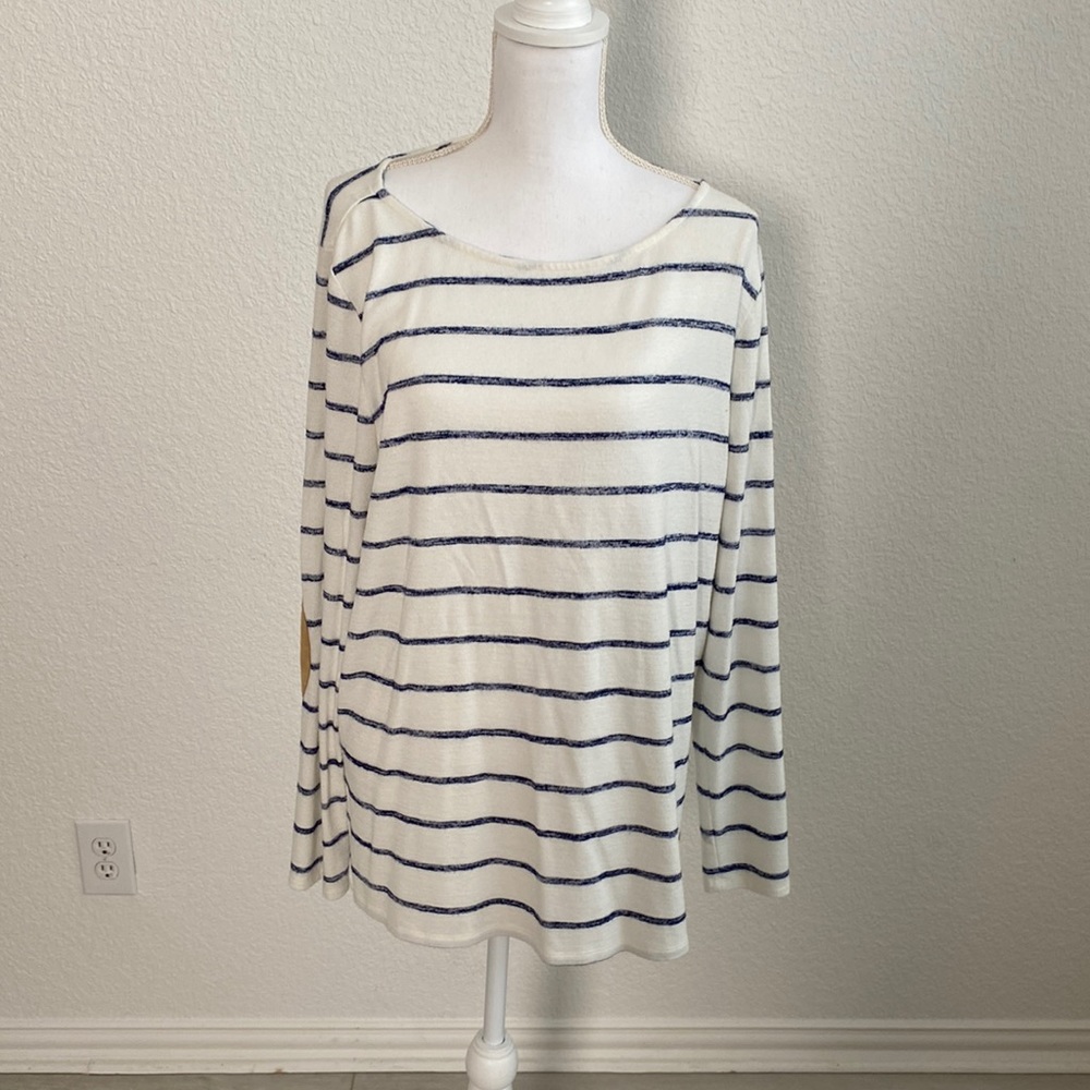 White and blue striped sweater.